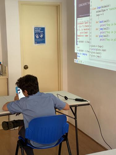 Students learn python coding at STEMLOOK