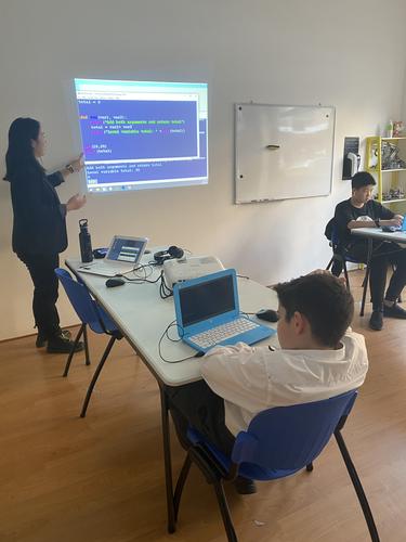 Students learn python coding at STEMLOOK